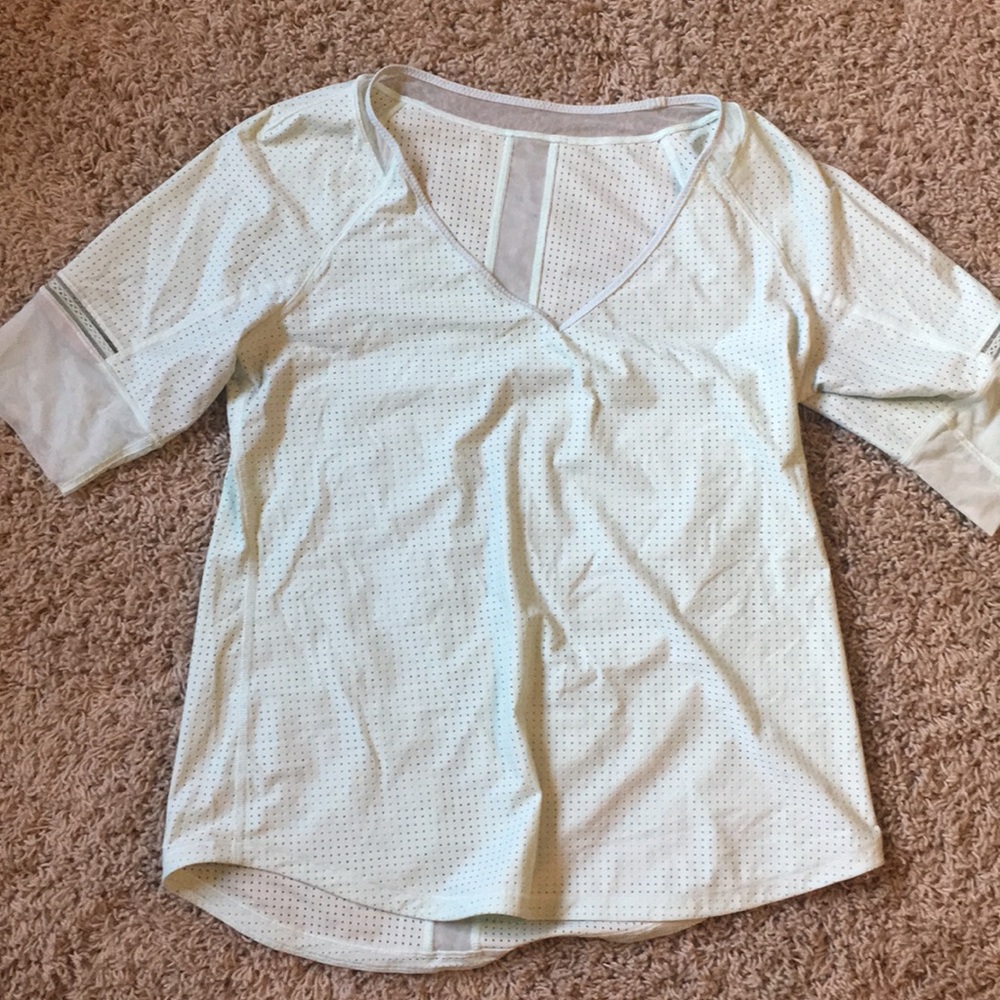 Mint green athletic shirt, mid length sleeve